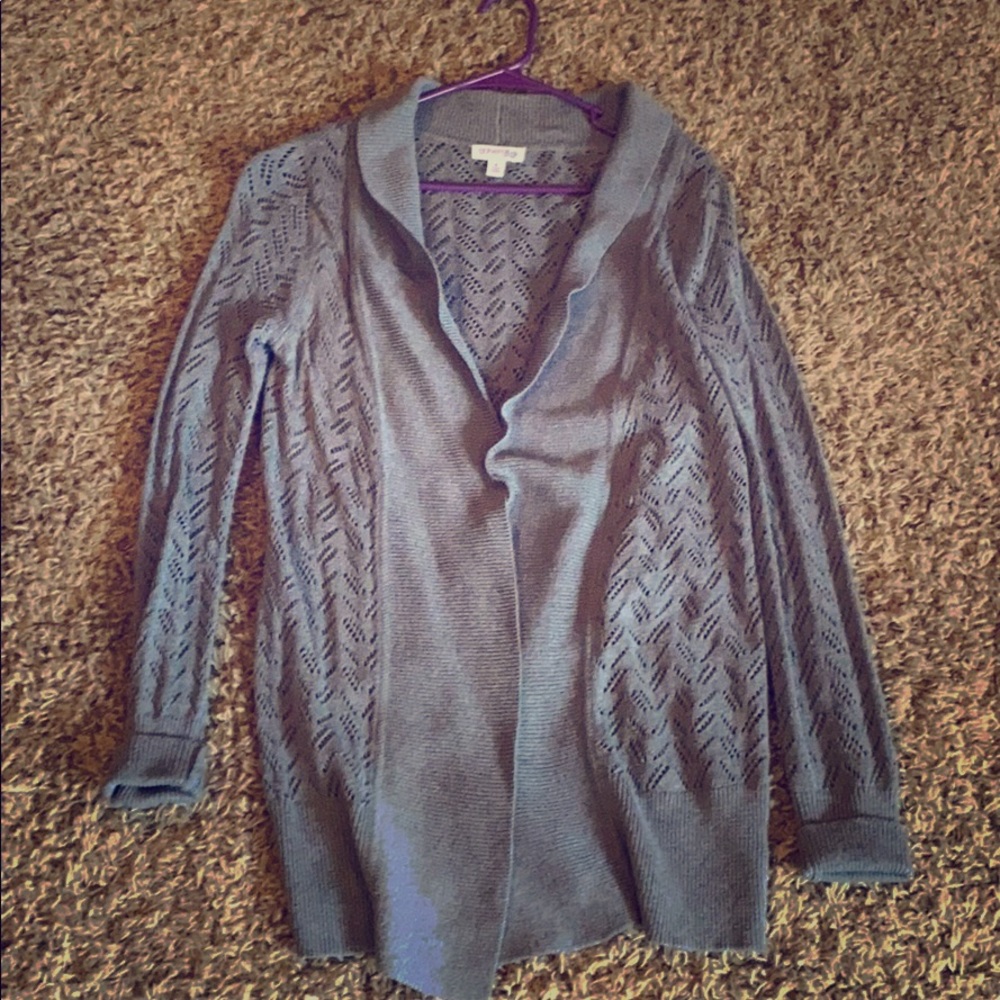 Woman’s grey knit cardigan